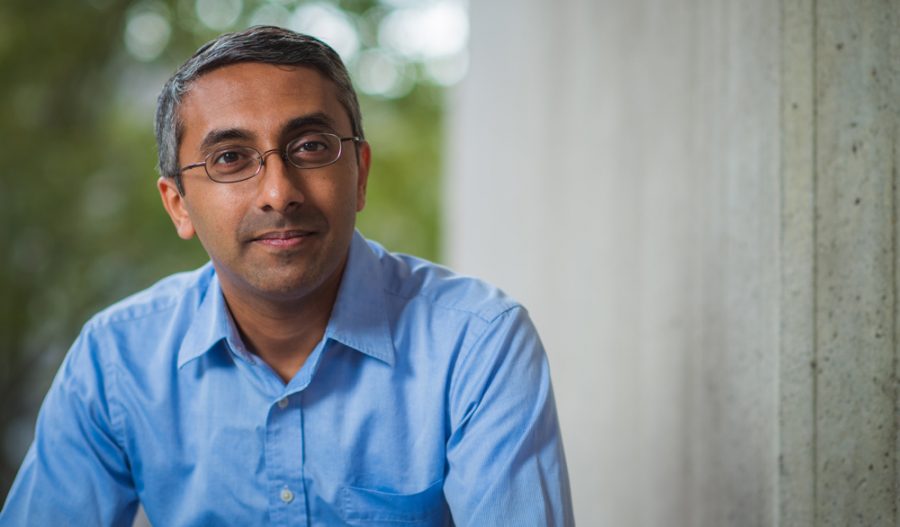 Yogesh Surendranath stands in front of Building 18 on the MIT Campus.