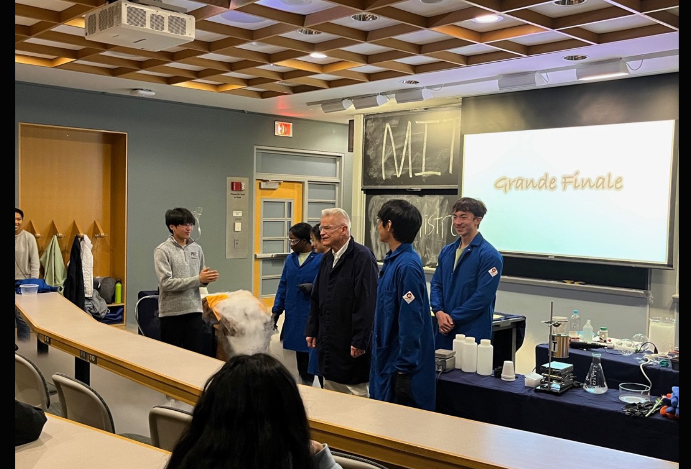 A group of students conduct magical experiments in a classroom.